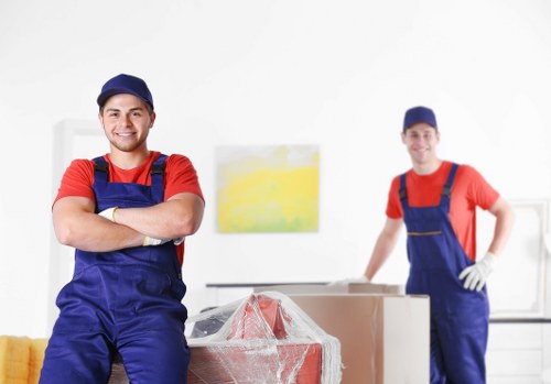Removal company staff reviewing a customer complaint form