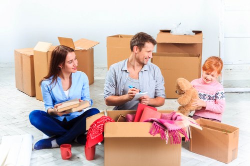 Professional movers navigating a Marylebone street for urgent relocation