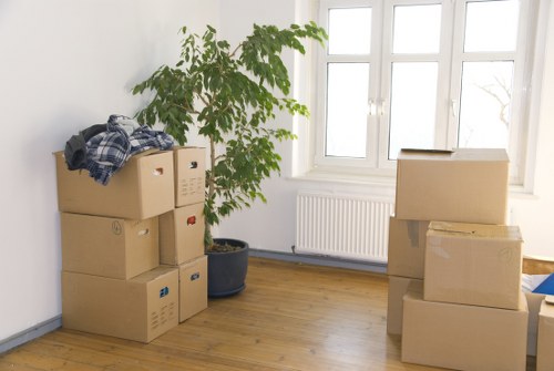 Student moving boxes carried through a Marylebone property entrance