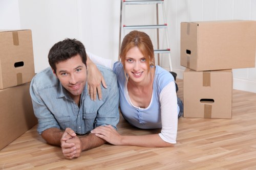 Local moving team handling furniture in central London streets near Marylebone