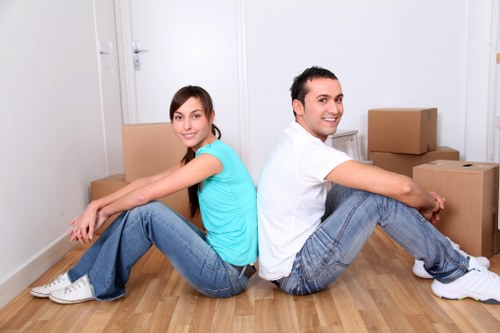 Trained movers using protective equipment during a relocation
