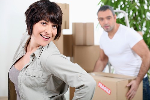 Professional movers handling furniture in Marylebone